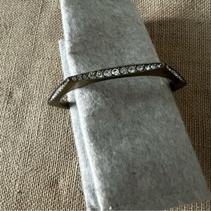Chloe and Isabel gold tone antique crystal embellished rigid circle bangle